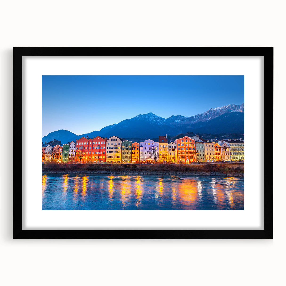 Colorful abstract art print of a European landscape, in a black frame with mat, ideal for living room decor.