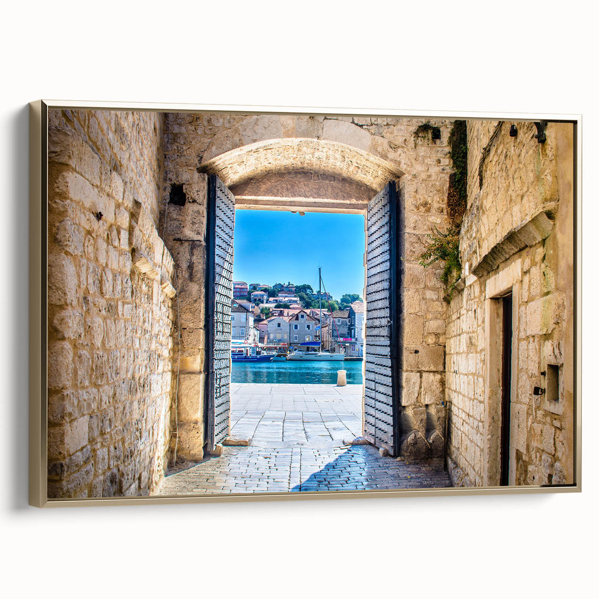 Framed canvas wall art depicting a vintage-style Croatian landscape in muted gold and black tones, ideal for bedroom decor.