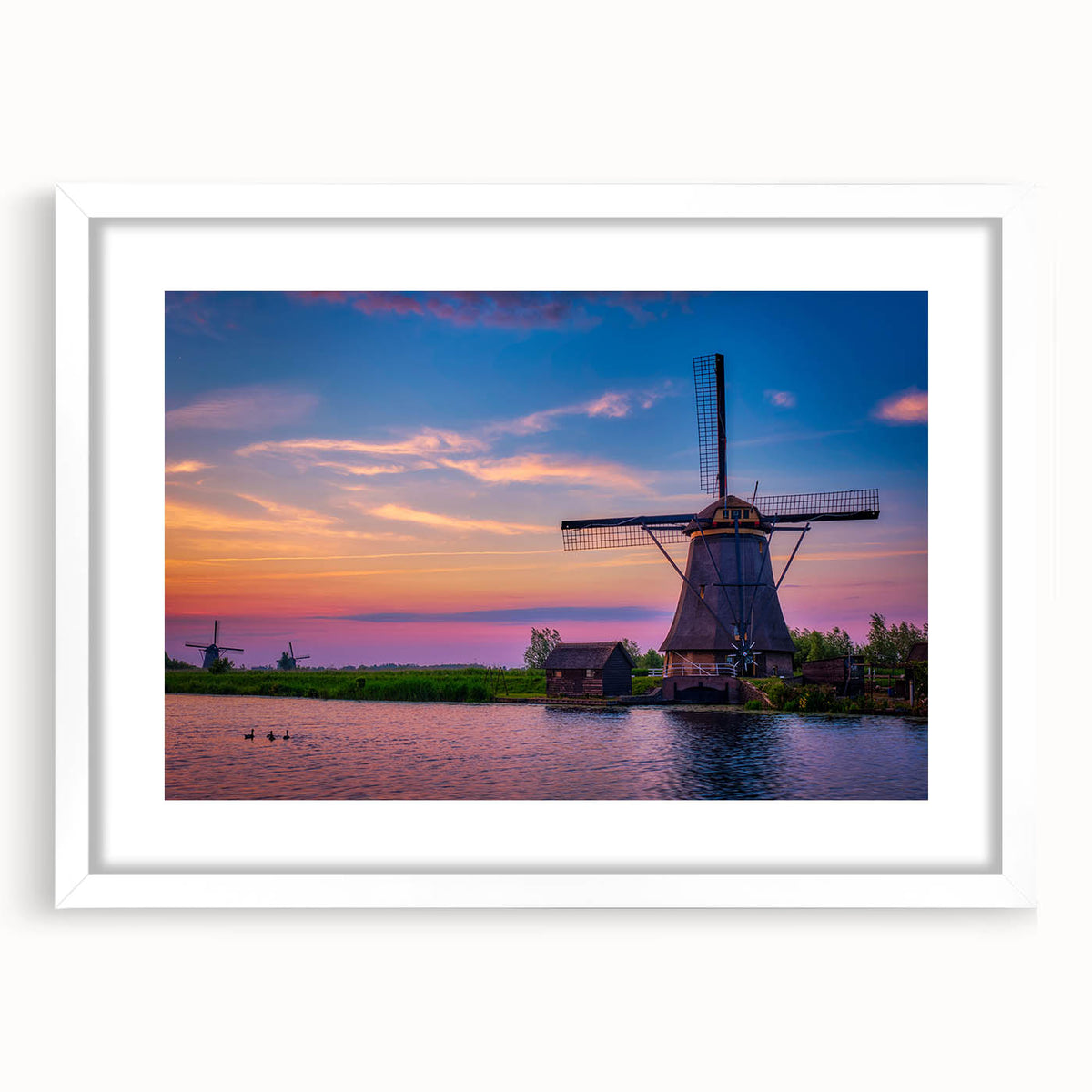 Textured abstract art print of a European landscape in muted earth tones, framed with a white mat.