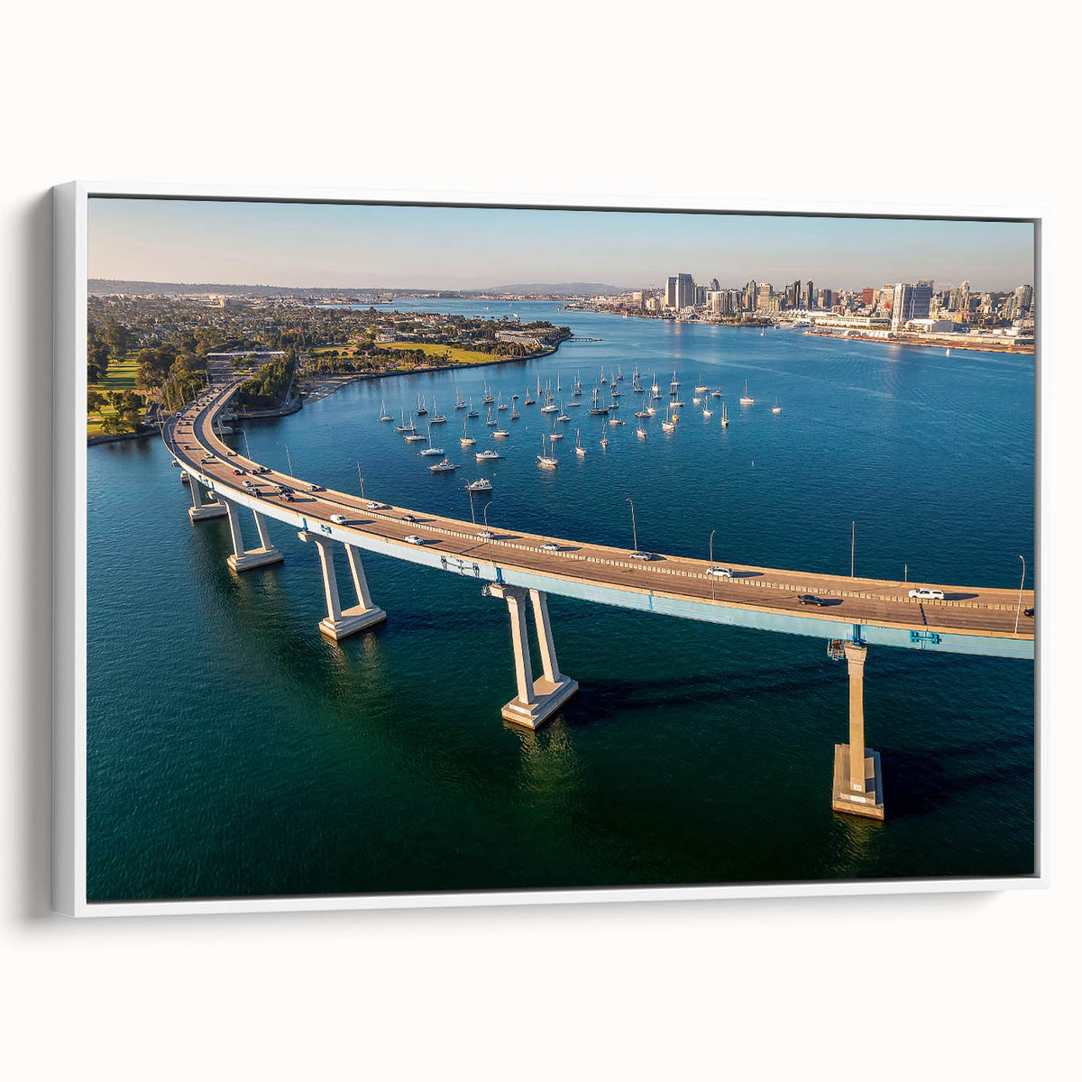 Vintage poster art of Coronado, California depicted in colorful hues on a large framed canvas, ideal for living room decor.
