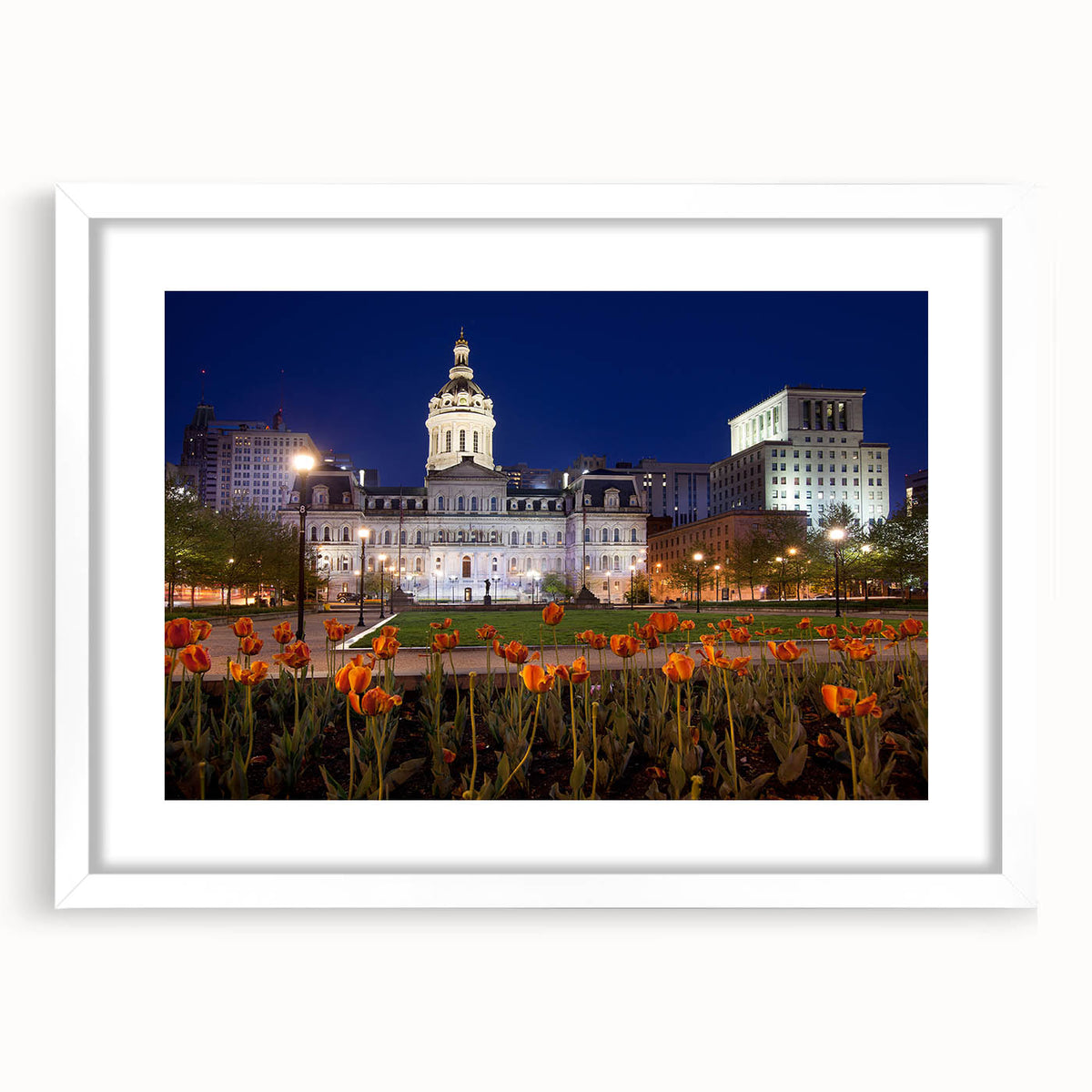 Abstract art print of Baltimore skyline in muted gray and blue tones on a framed white mat, ideal for dining room decor.