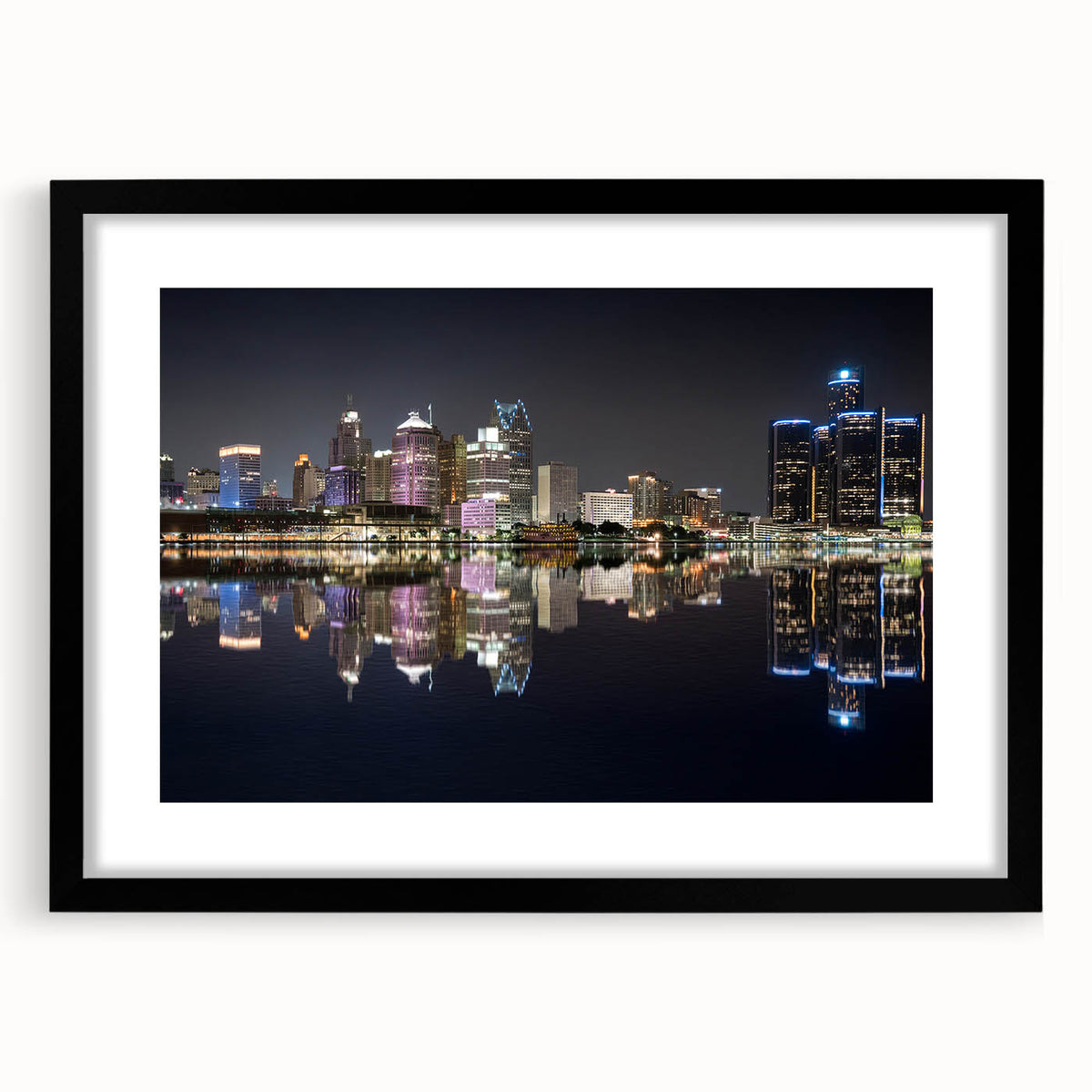 Abstract art print of Detroit skyline in vibrant colors on a large framed canvas, ideal for living room decor.