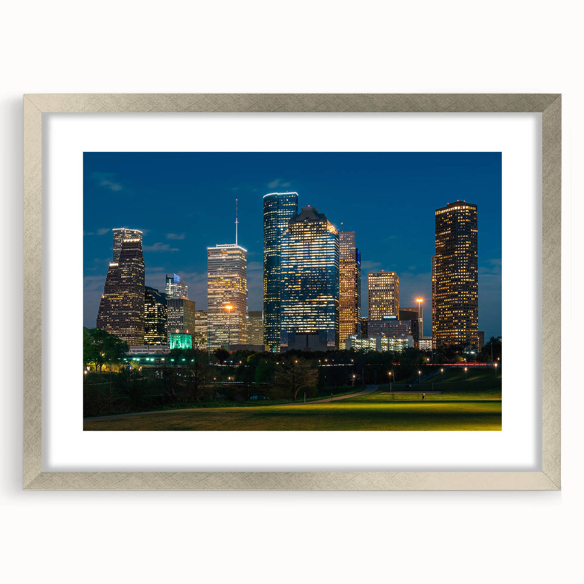 Textured art print of abstract Houston skyline in muted gray and silver tones, framed with a silver mat.