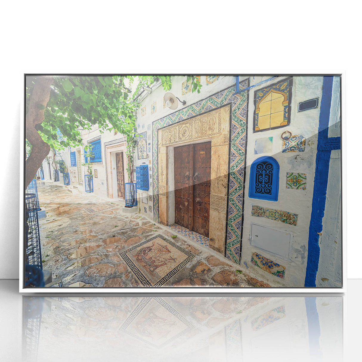 Acrylic print of a Tunisian landscape in muted earth tones, framed in white, suitable for modern art wall decor.