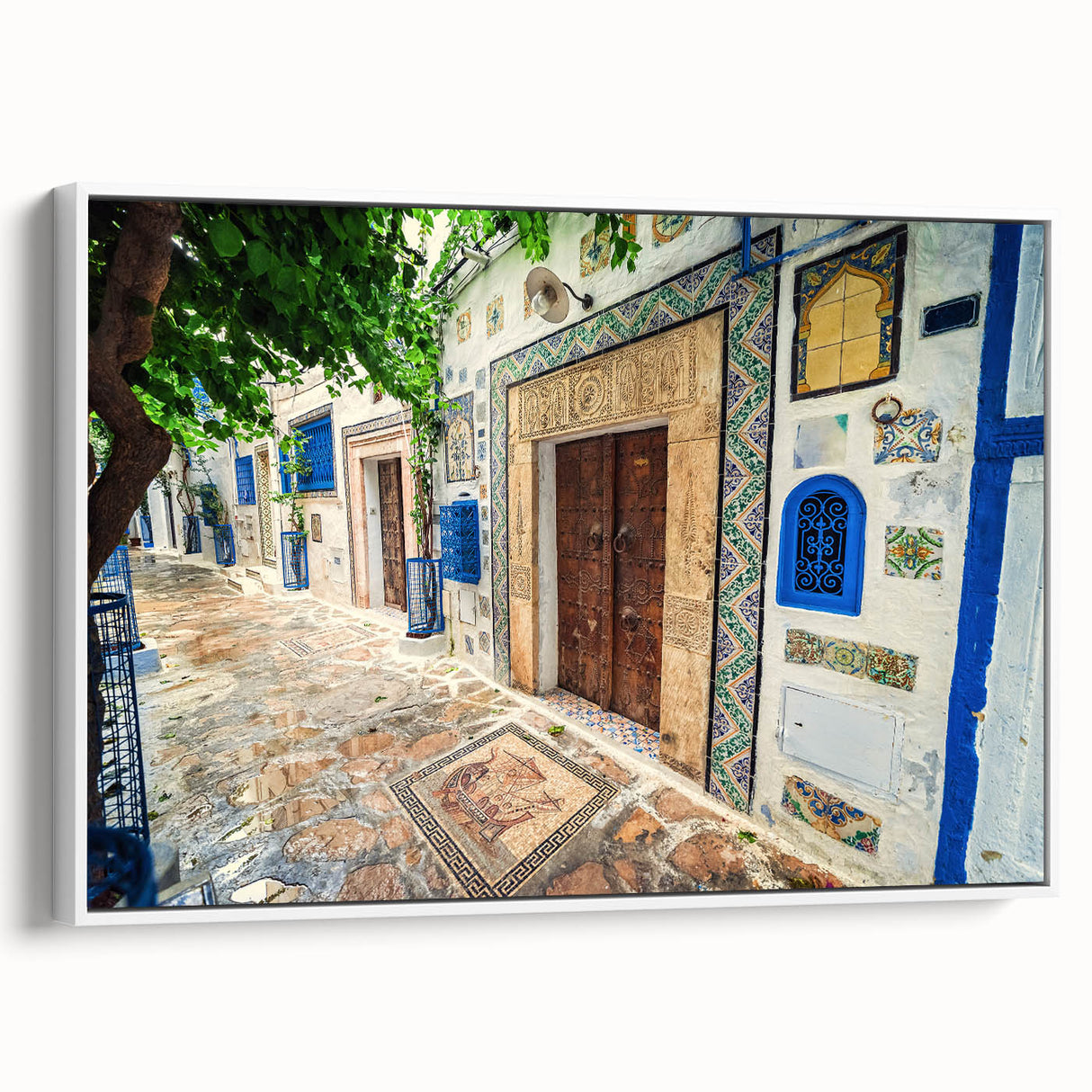 Vintage poster art of a Tunisian landscape in vibrant colors on a large framed canvas, ideal for living room decor.