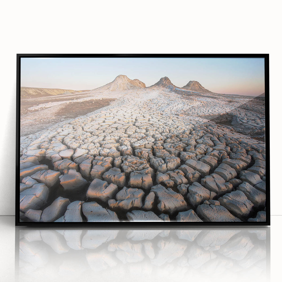 Large abstract wall art depicting an Asian landscape in muted earth tones, framed in black acrylic.