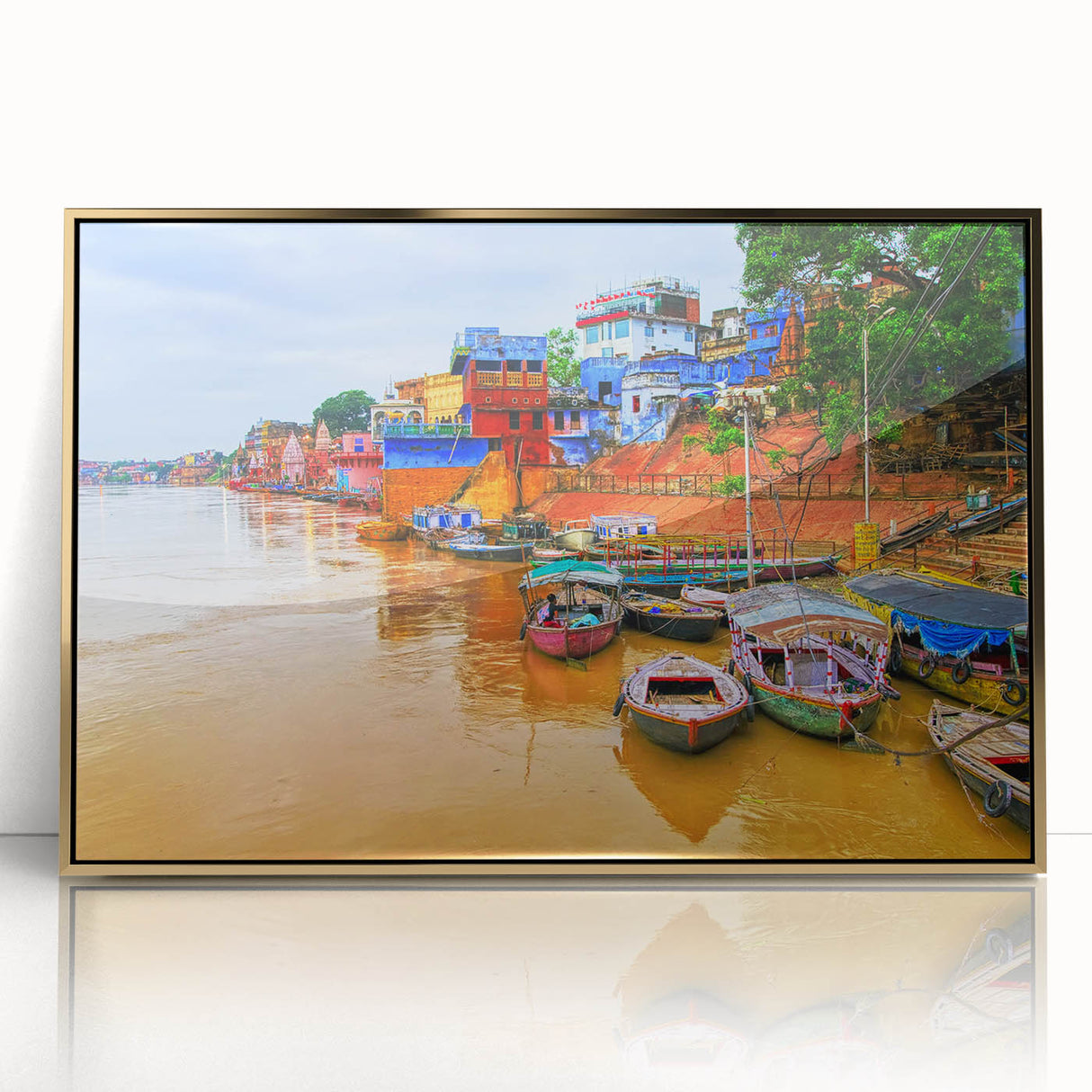 Large art print of an Indian landscape in gold and green tones, acrylic framed, mid-century modernist style.