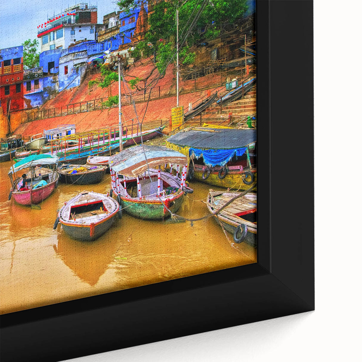 Extra large framed canvas featuring a textured depiction of a vibrant Indian scenery in black with colorful accents.