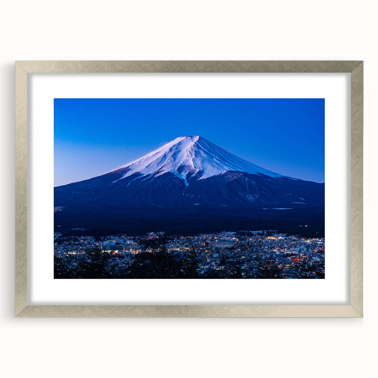 Textured art print of abstract Japanese scenery in muted earth tones, framed in silver, ideal for bedroom art.
