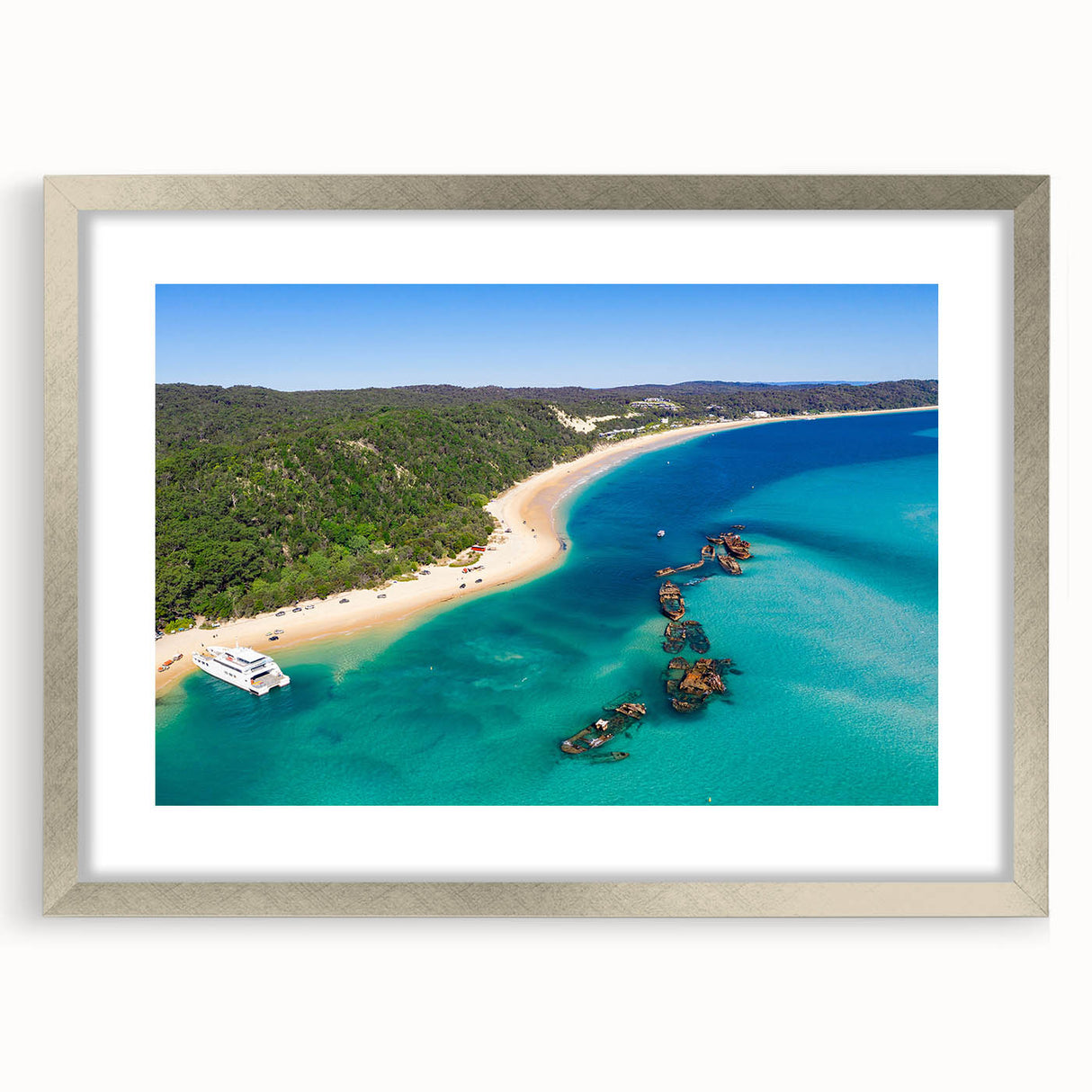 Abstract art print of Brisbane scenery in muted gray and blue tones, framed with a silver mat.