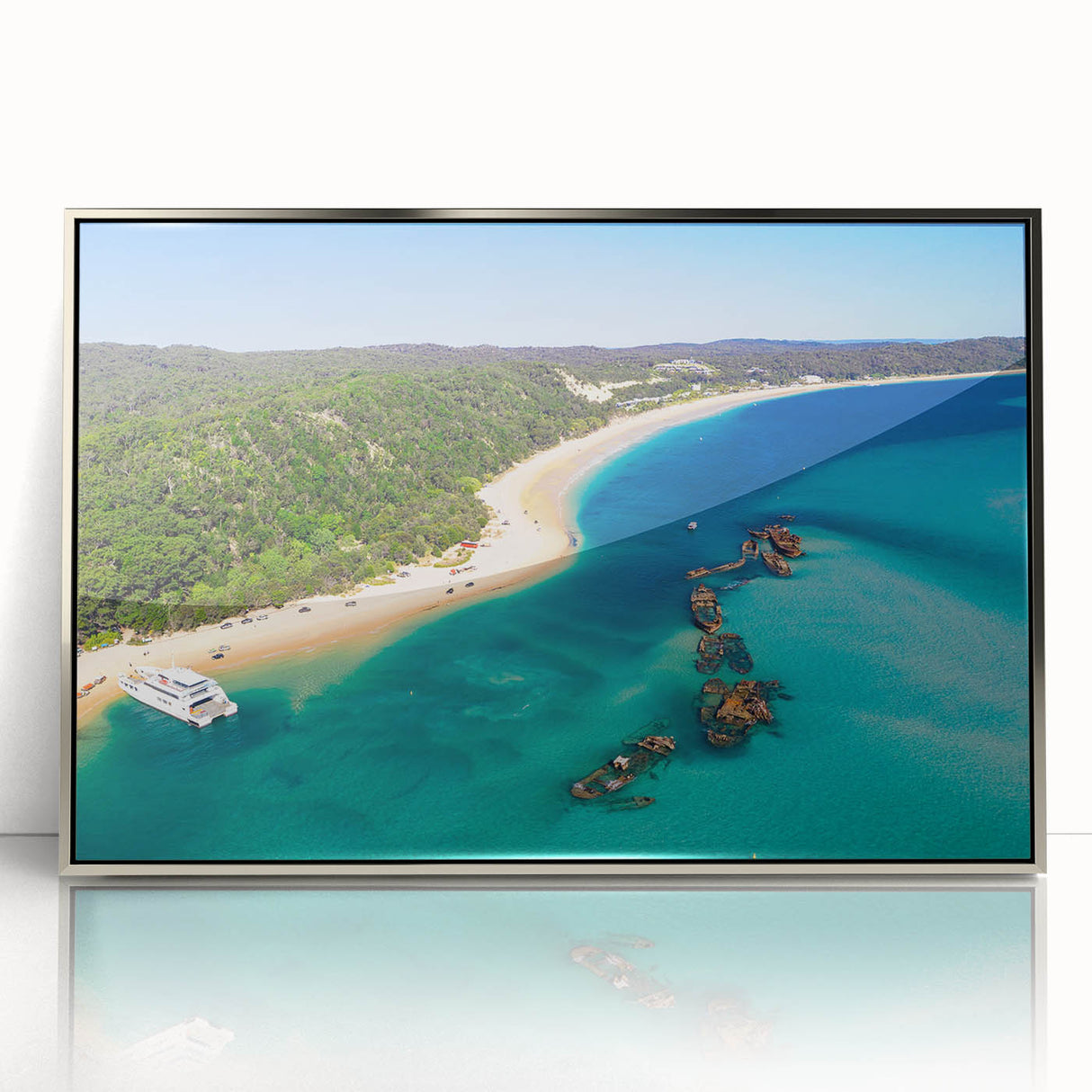 Art deco poster featuring a stylized Brisbane skyline in silver tones on a framed acrylic.