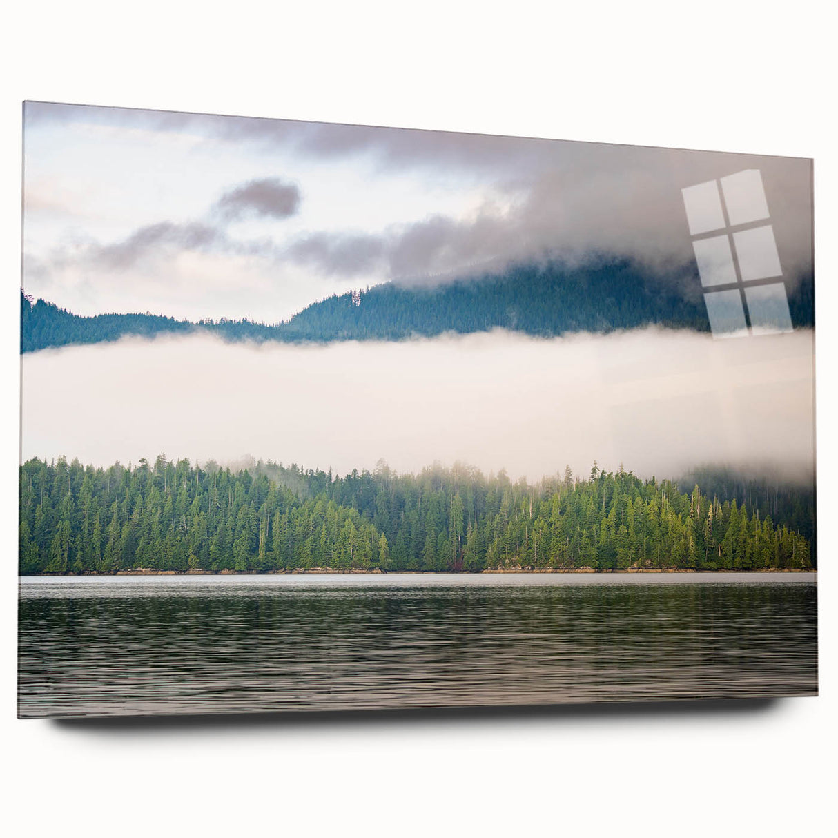 Large abstract wall art of British Columbia scenery in muted green and blue tones on acrylic glass.