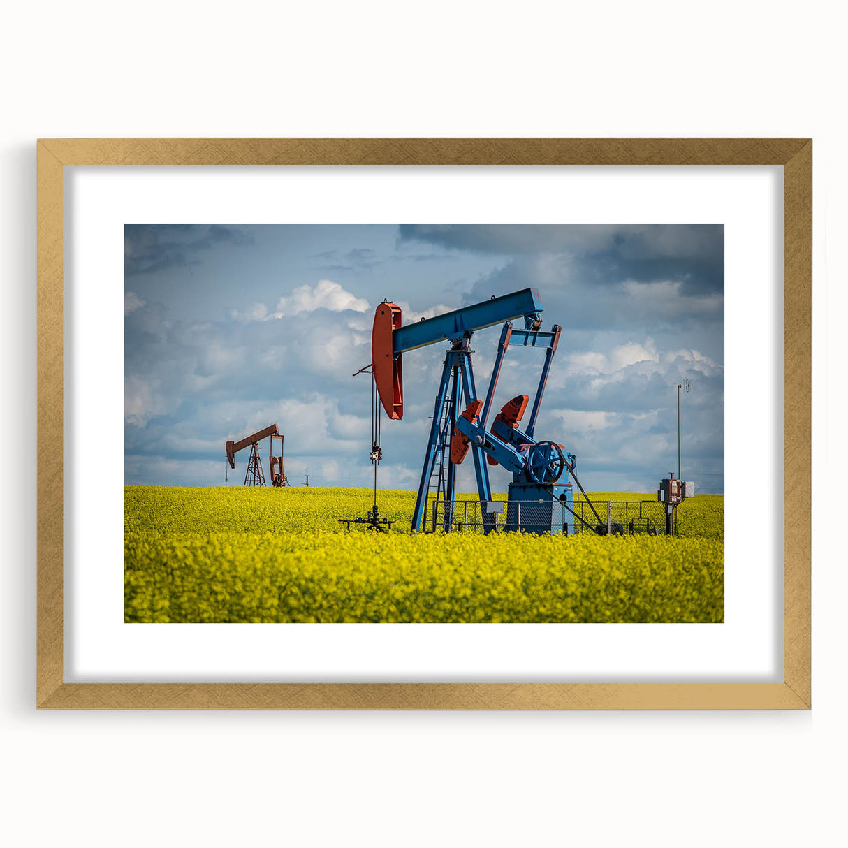 Extra large abstract art print depicting textured scenery of Saskatchewan, in gold frame with mat.