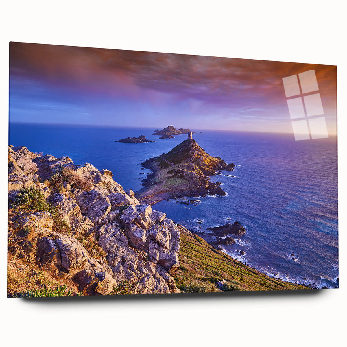 Large abstract wall art of the Corsican coast in muted blues and greens on acrylic glass.