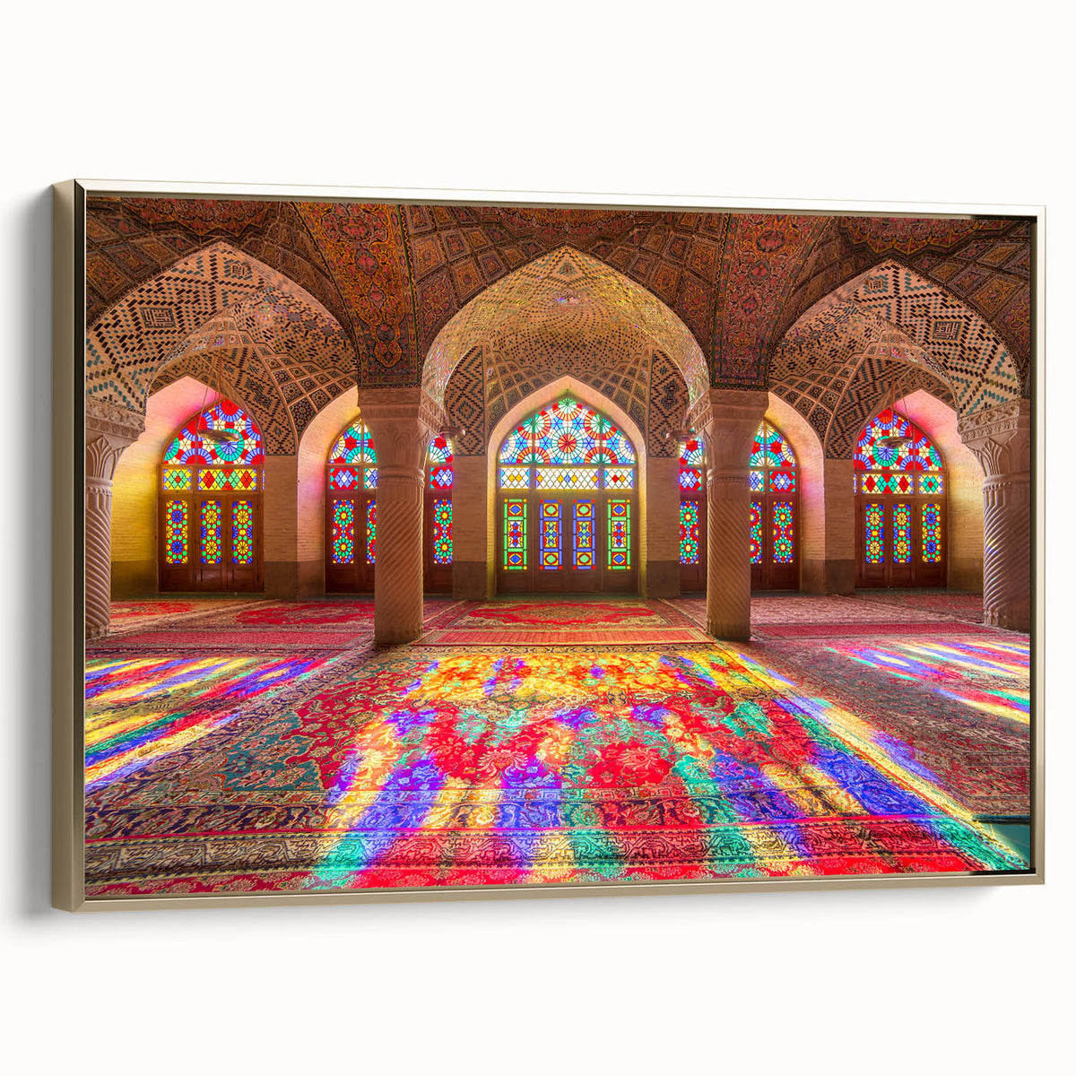 Framed canvas featuring a vintage-style landscape painting of a Middle Eastern scenery in gold and black tones.