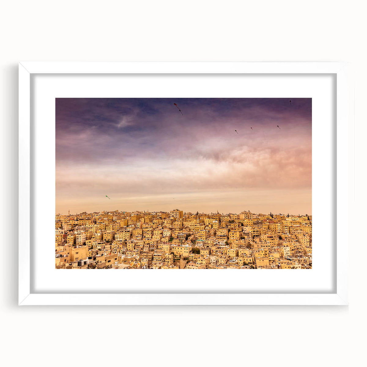 Abstract art print of a Jordanian landscape in muted earth tones on a framed white mat, ideal for dining room decor.