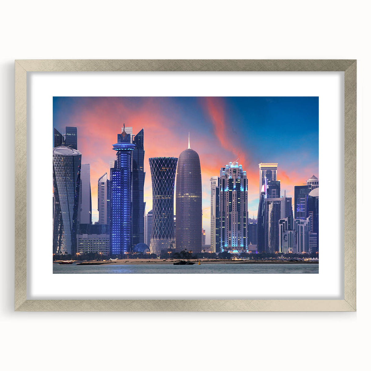 Textured abstract art print depicting Middle Eastern scenery in muted earth tones, framed in silver.