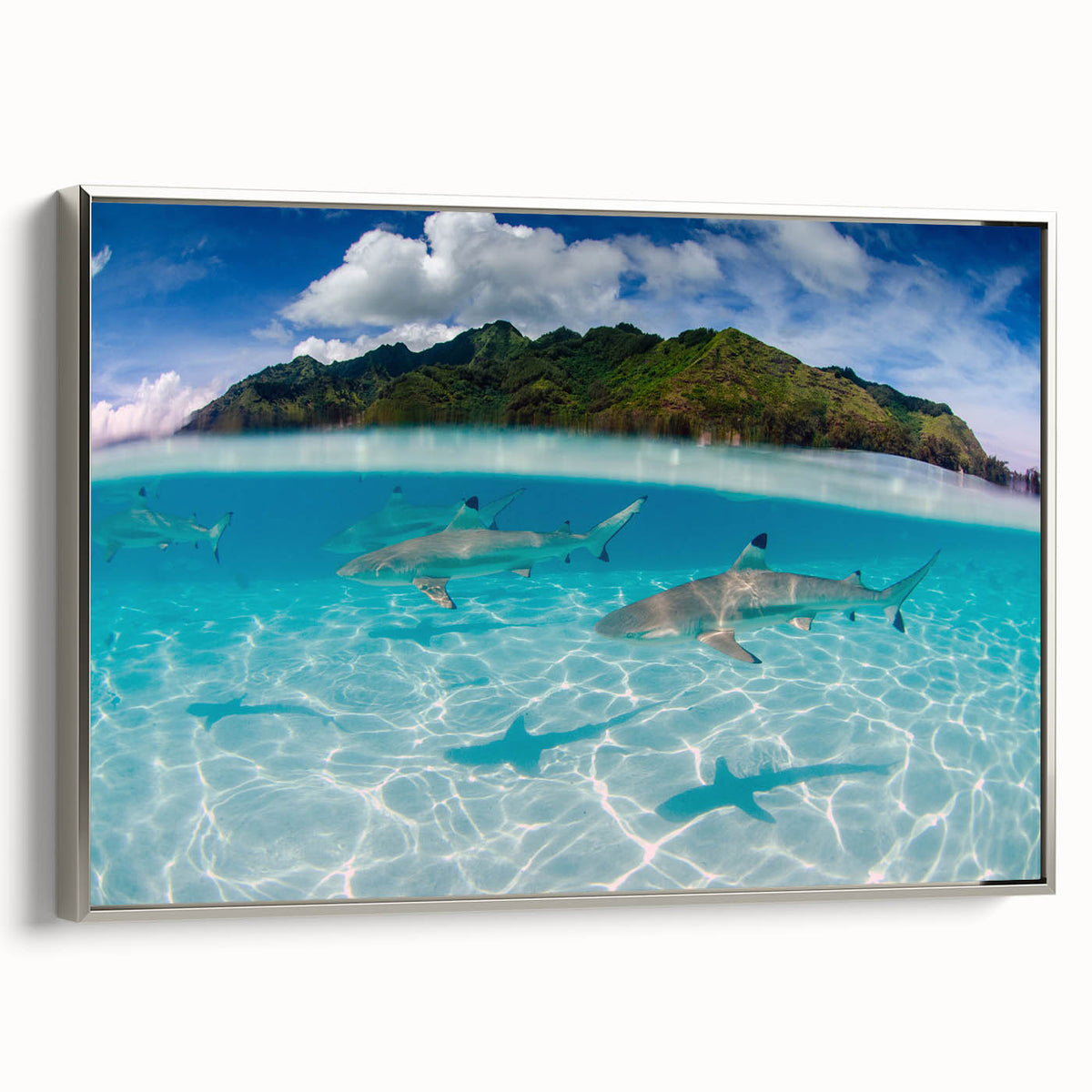 Framed canvas of a Tahitian landscape painting in vibrant blues and greens, ideal for a living room or hallway.