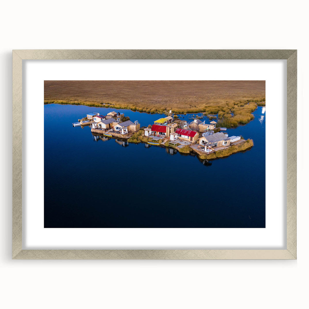 Textured abstract art print depicting a Peruvian landscape in muted earth tones, framed in silver, ideal for bedroom art.