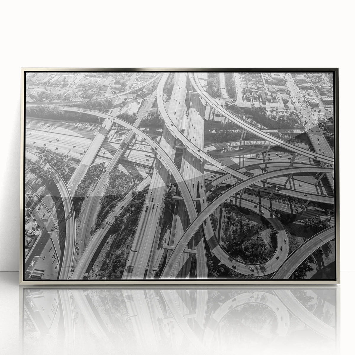 Mid-century modernist art depicting the Los Angeles skyline in muted pastel shades, framed in silver acrylic.