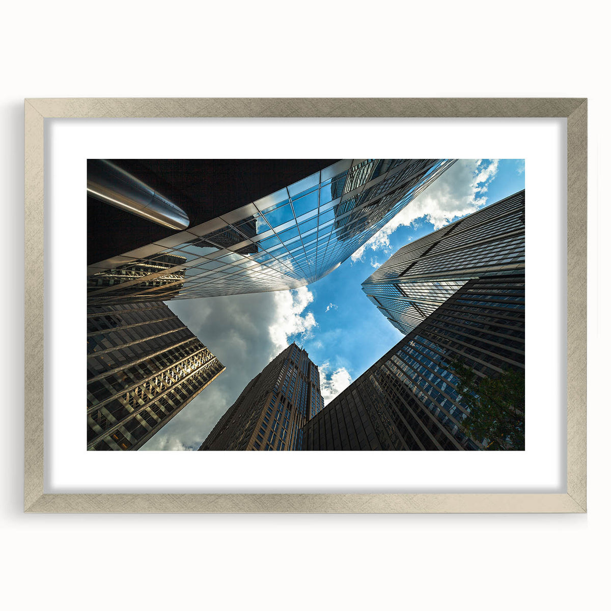 Textured art print of abstract Chicago skyline in muted gray and blue tones on a framed canvas, suitable for bedroom decor.