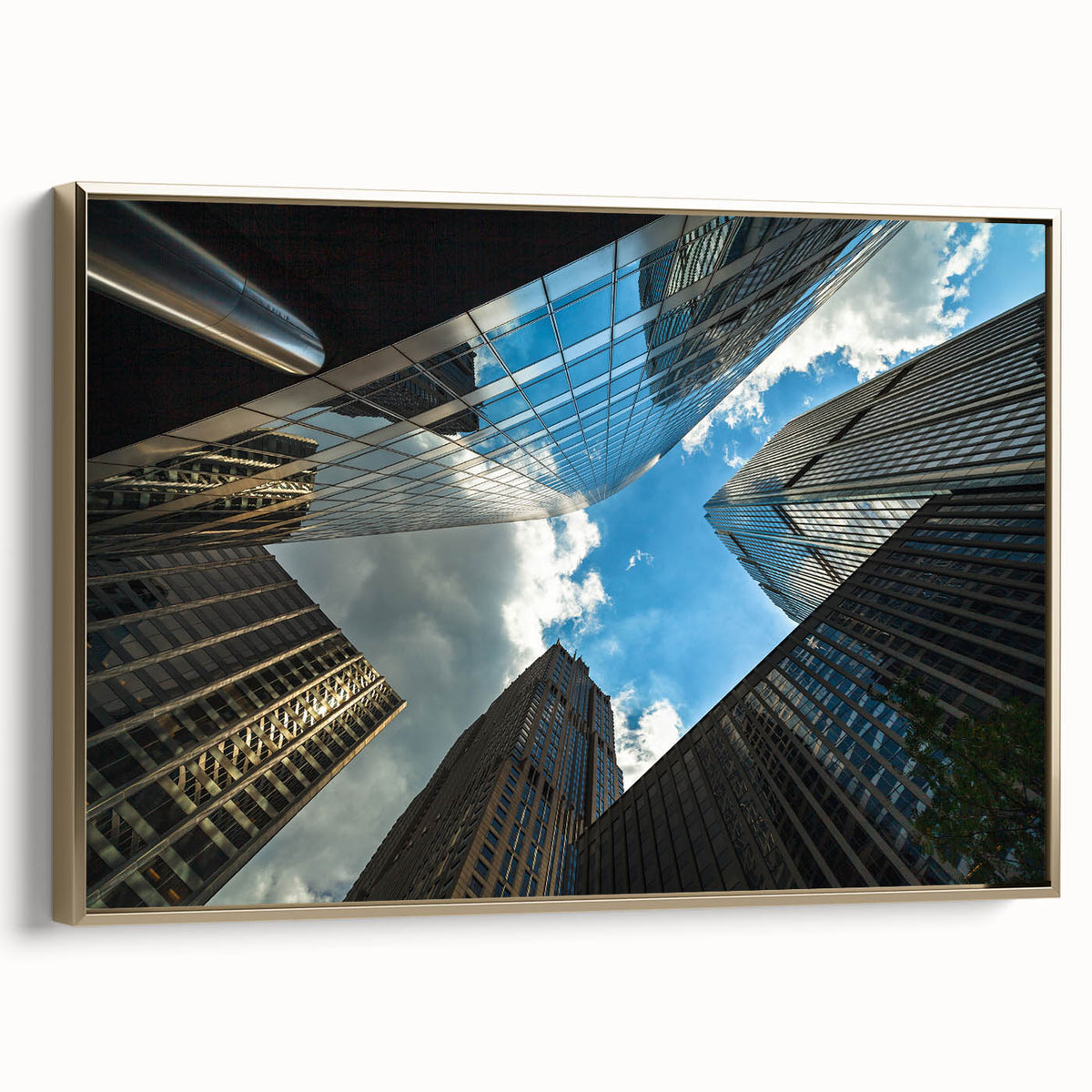 Framed canvas featuring a vintage-style landscape painting of the Chicago skyline in black and gold tones.