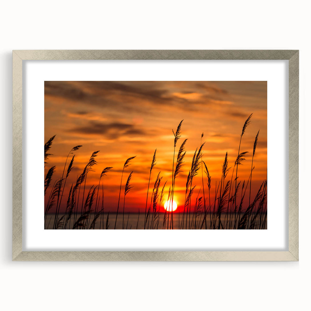 Textured abstract art print of Chesapeake Bay in muted blue and green tones on a framed silver mat, suitable for bedroom art.