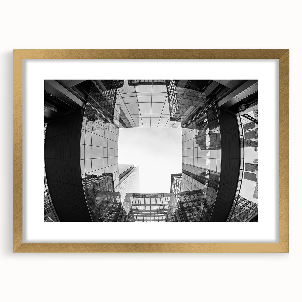 Extra large abstract art print of Charlotte skyline in muted gray and gold tones, framed with a mat.