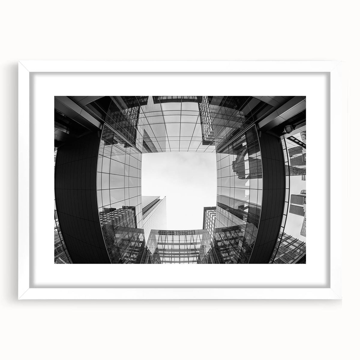 Abstract art print of Charlotte skyline in muted gray and blue tones on a framed white mat.
