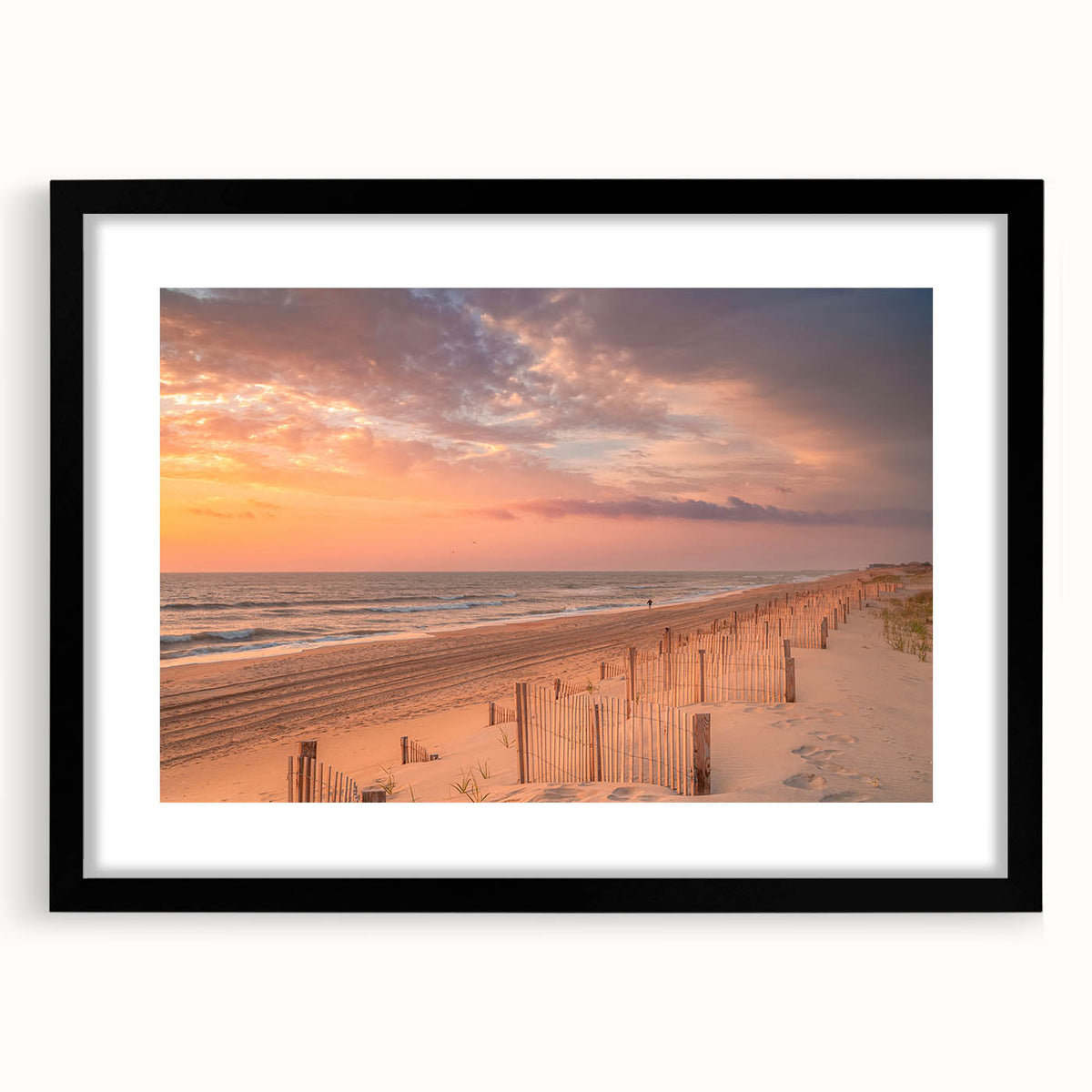 Colorful abstract art print of Outer Banks, featuring vibrant blue and orange hues on a large framed canvas.
