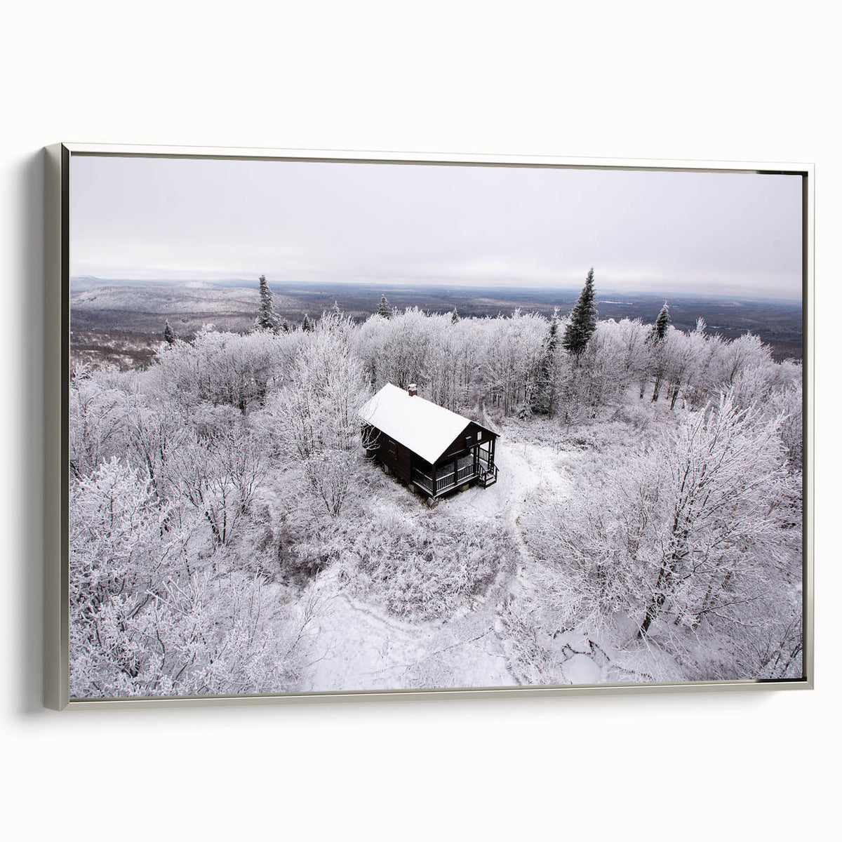 Framed canvas depicting a vintage-style landscape of the Adirondacks with colorful art on a black background.