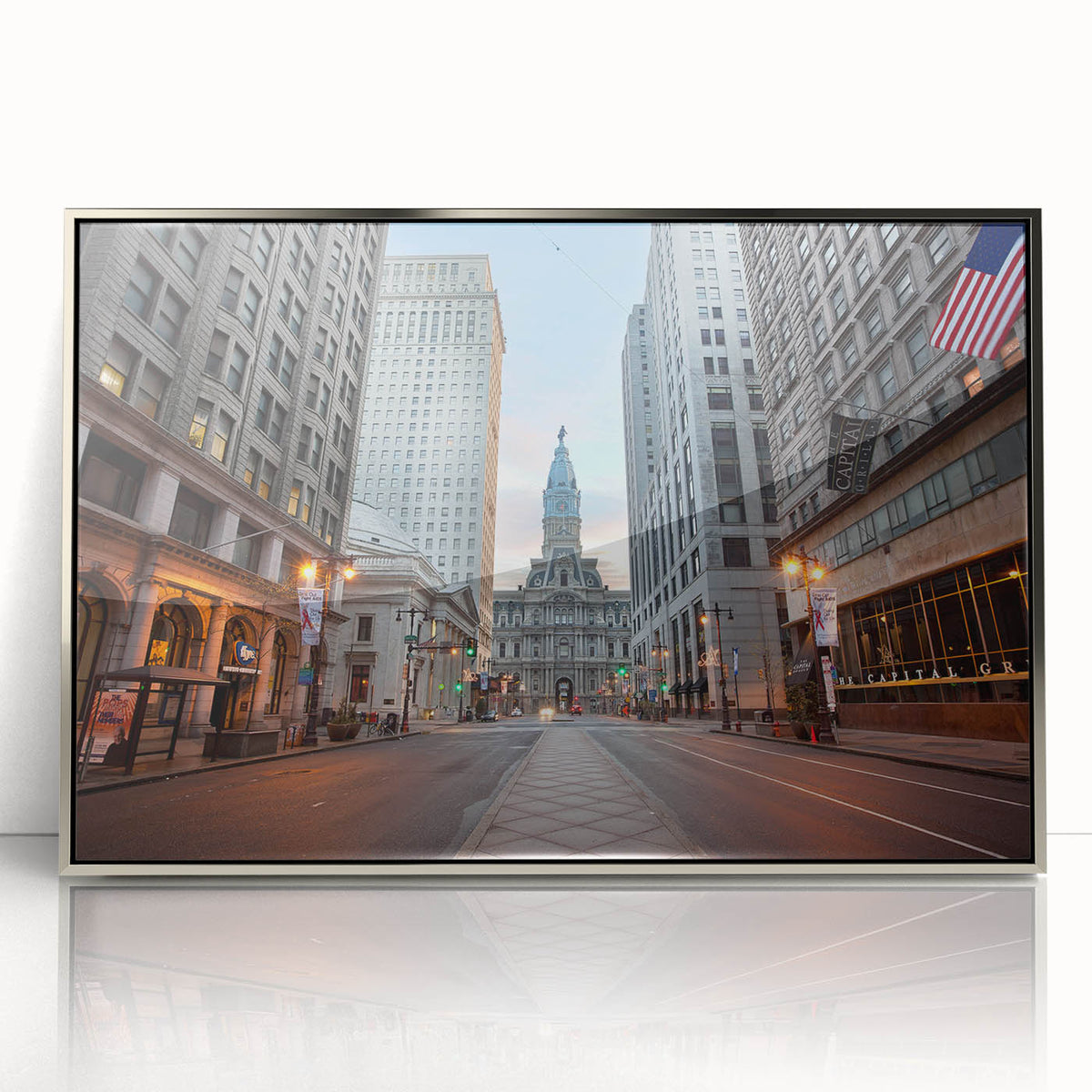 Mid-century modernist art of Philadelphia skyline in muted blues and grays on a silver-framed acrylic.
