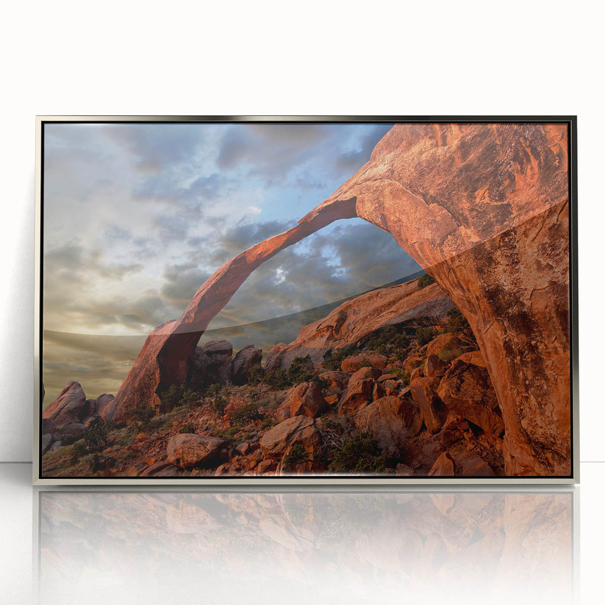 Mid-century modernist art of Arches National Park in Utah, rendered in warm earth tones on a silver-framed acrylic print.