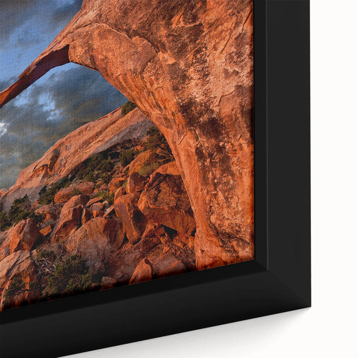 Extra large framed canvas featuring a textured depiction of Arches National Park in black with colorful highlights.