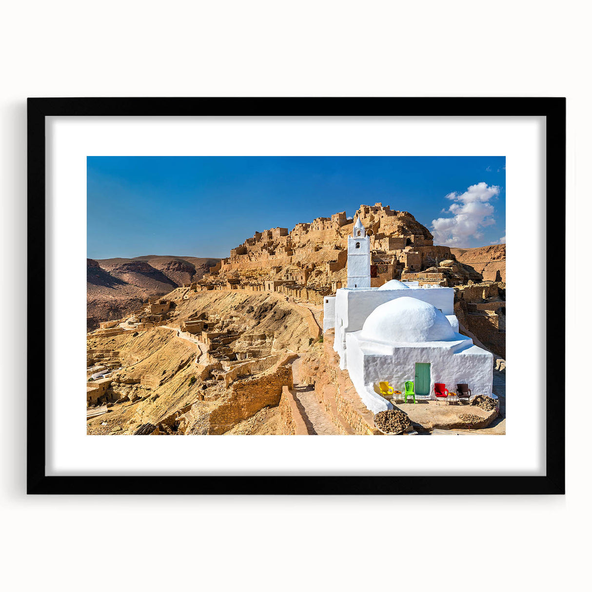 Extra large abstract art print depicting colorful, textured scenery of Tunisia on a black framed canvas.