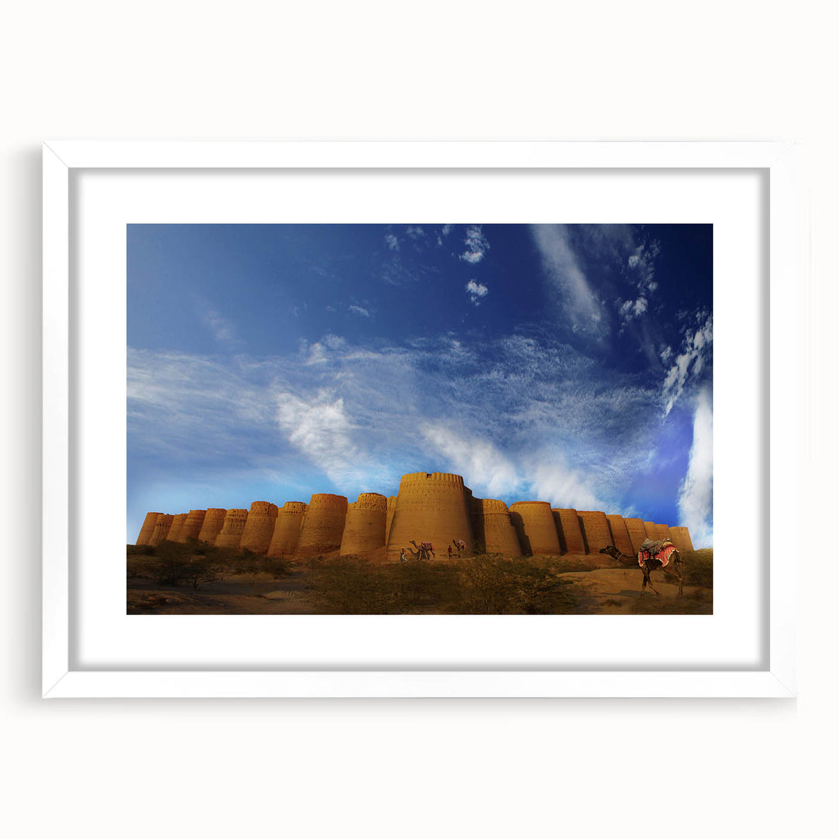 Abstract art print of a Pakistani landscape in muted earth tones on a framed white mat, ideal for dining room decor.