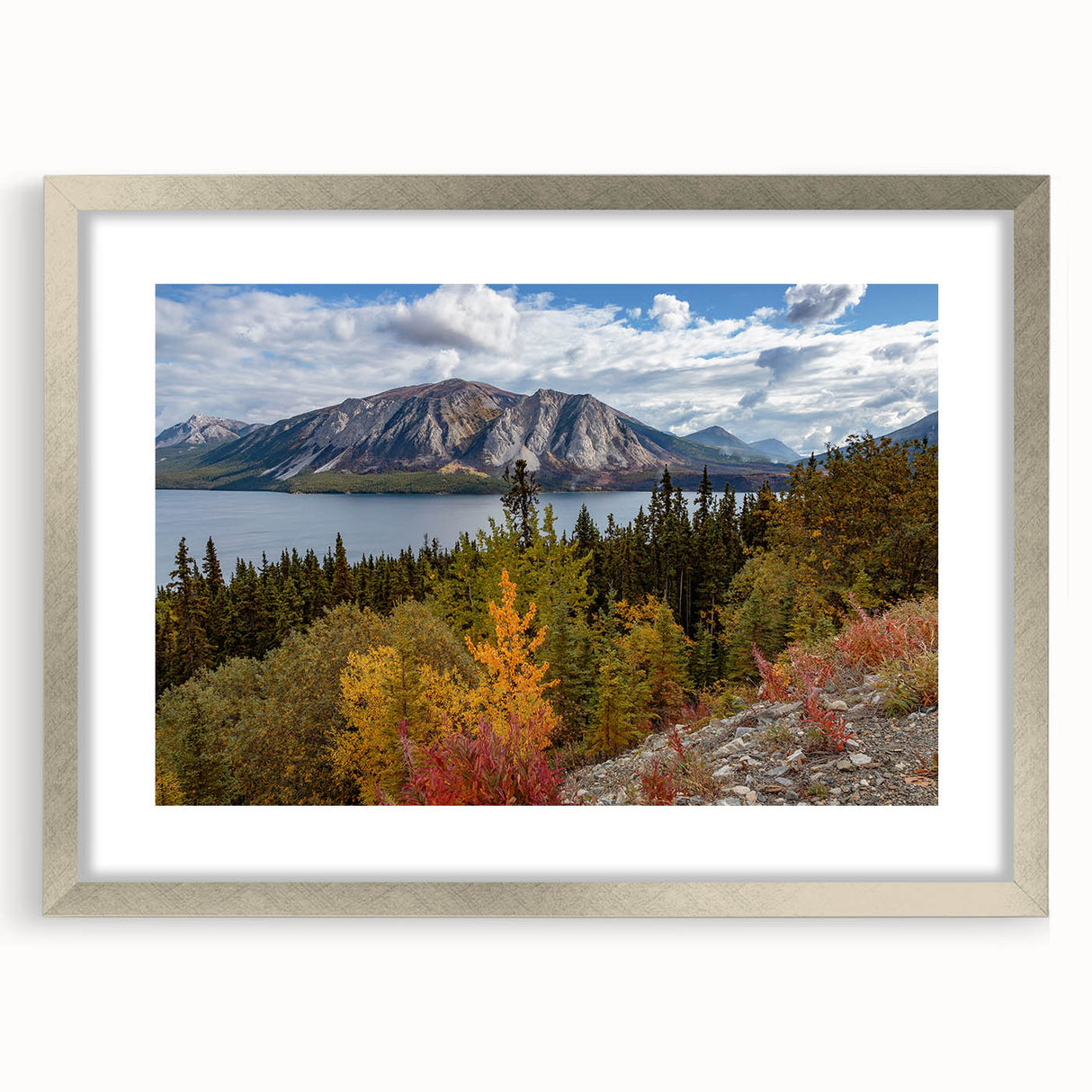 Textured abstract art print of the Yukon scenery in muted earth tones, framed in silver, ideal for bedroom art.