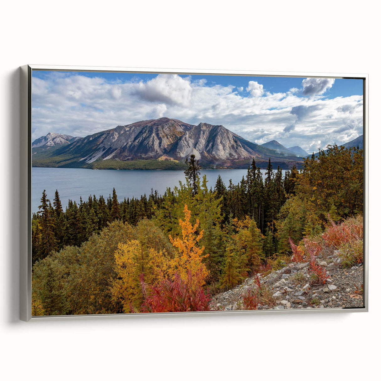 Framed canvas depicting a Yukon landscape with colorful art in a vintage poster style.