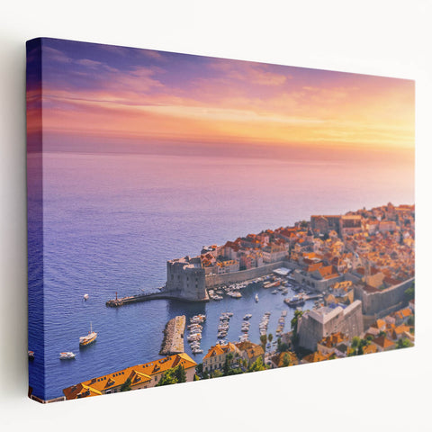 Large scenic print of a European coastline in blue and green hues on stretched canvas, suitable for kitchen wall art.