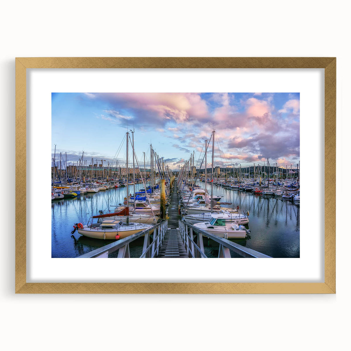 Abstract art print of Normandy scenery in muted earth tones, framed in gold, suitable for dining room decor.