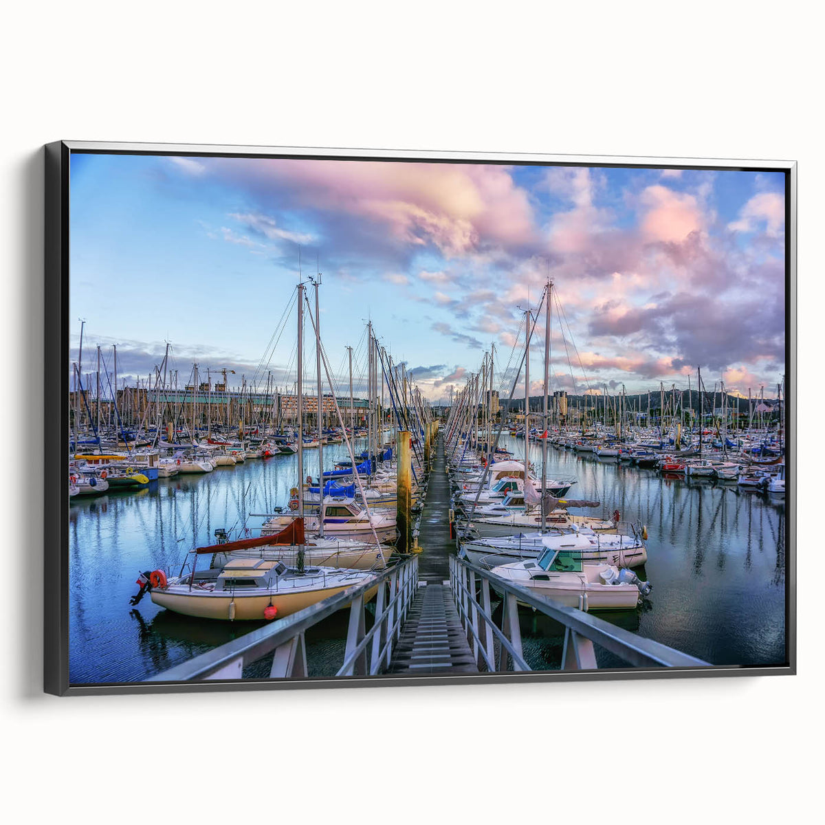 Black and white wall art featuring a vintage poster-style landscape of Normandy on framed canvas, suitable for bedroom decor.