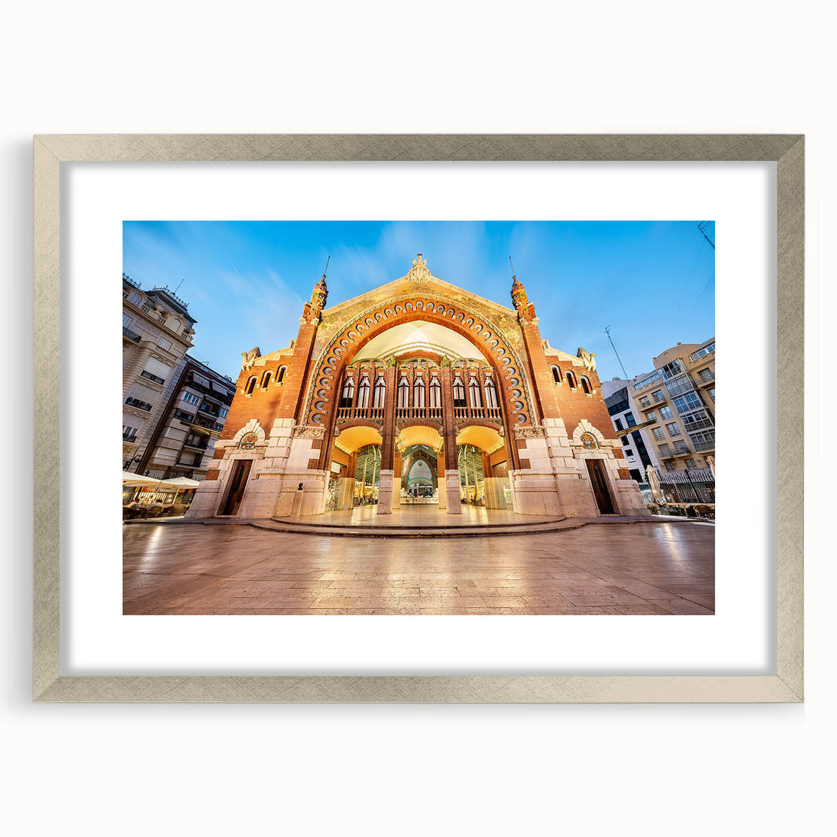 Textured abstract art print of Valencia scenery in muted earth tones, framed in silver, suitable for bedroom decor.