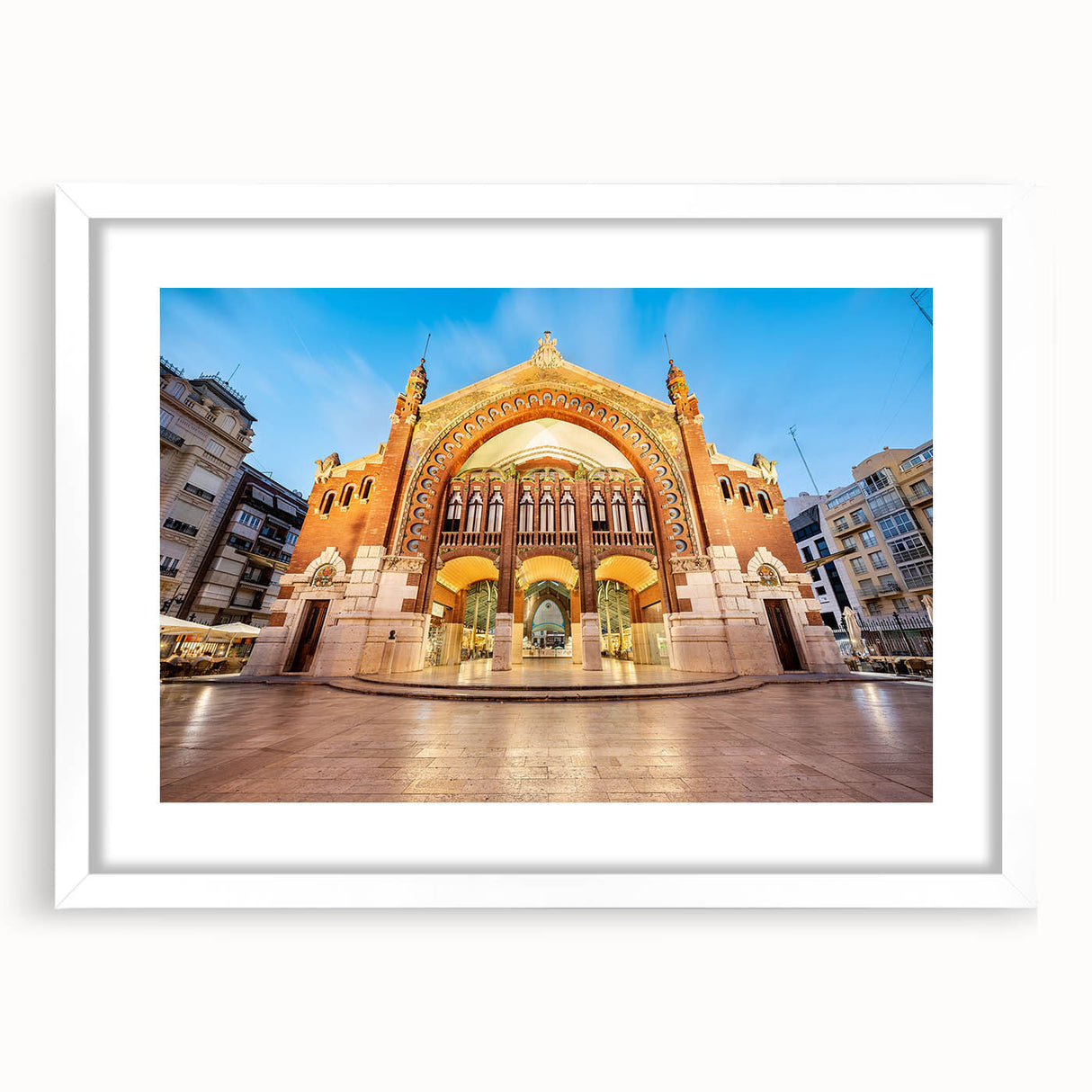 Abstract art print of Valencia with muted blue and orange tones on a framed white mat, ideal for dining room decor.