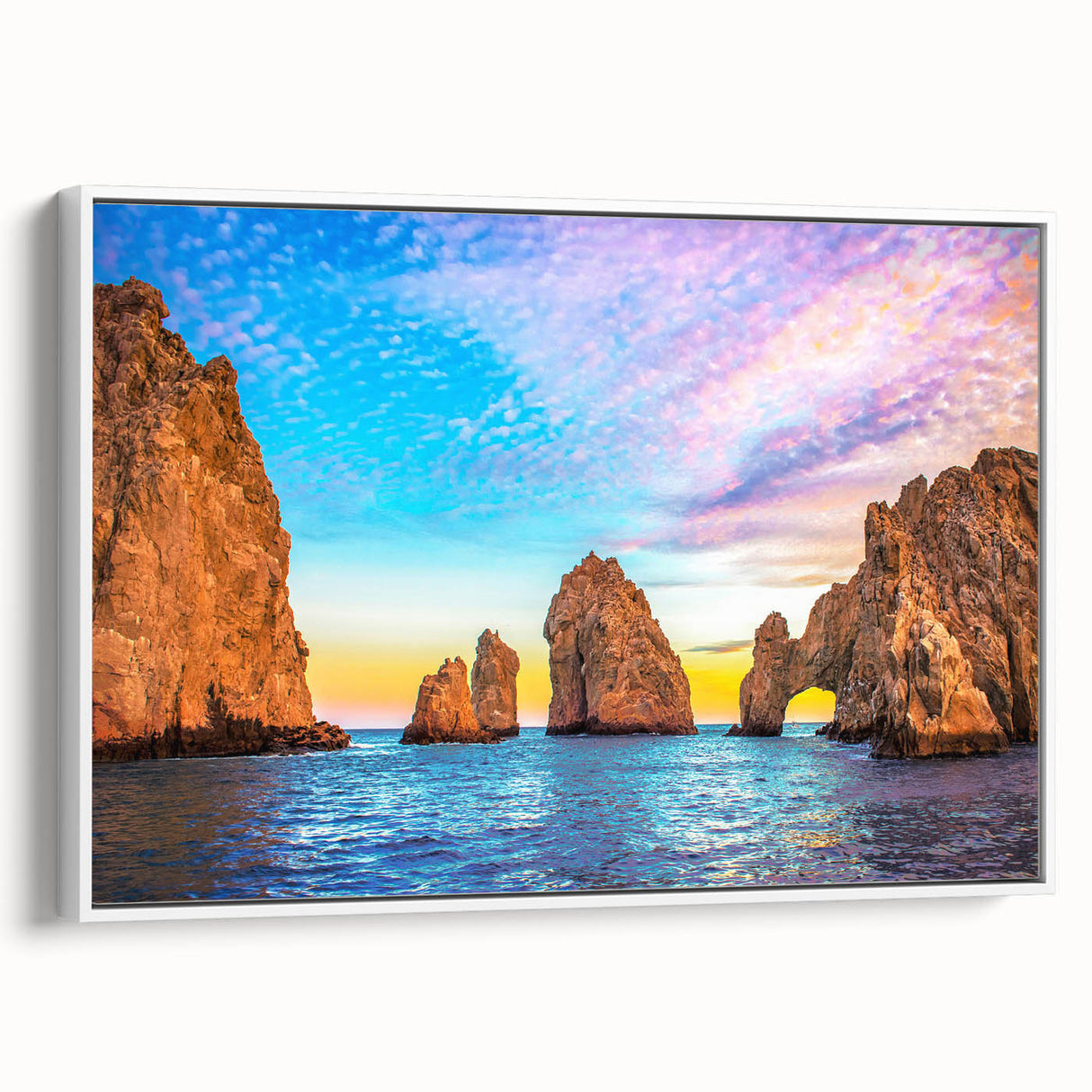 Vintage poster art of Baja California scenery on a framed canvas, featuring colorful art with black accents.
