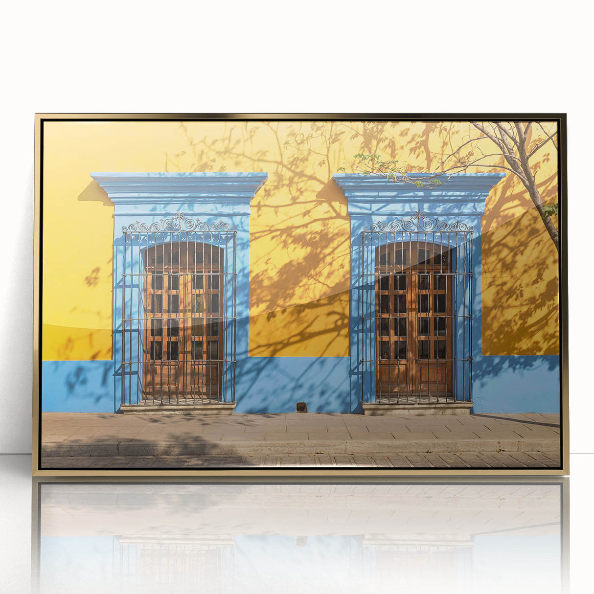 Large art print of Oaxaca, Mexico scenery on gold-framed acrylic, featuring mid-century modernist style.