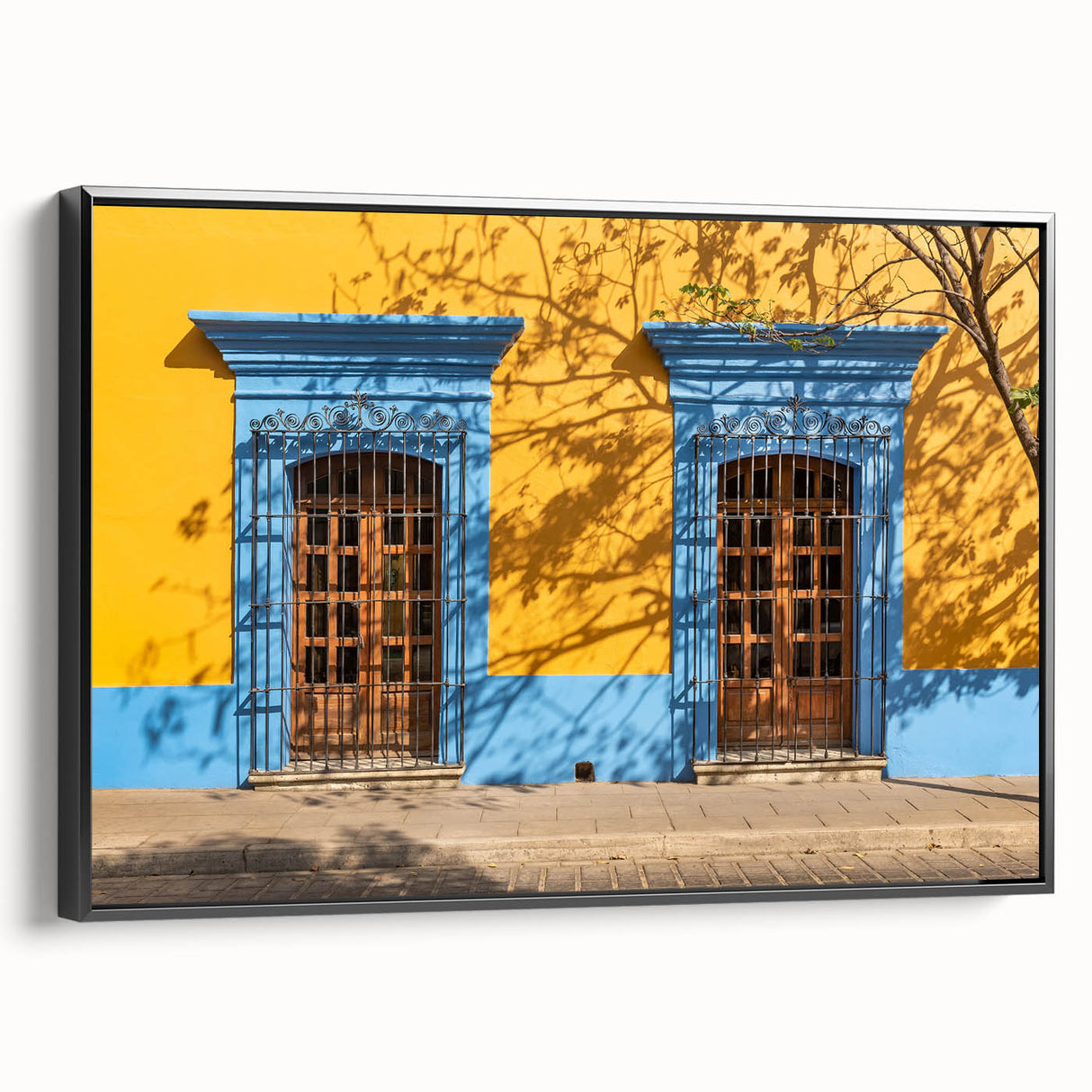 Black and white framed canvas depicting a vintage-style landscape of Oaxaca, ideal for bedroom wall art.