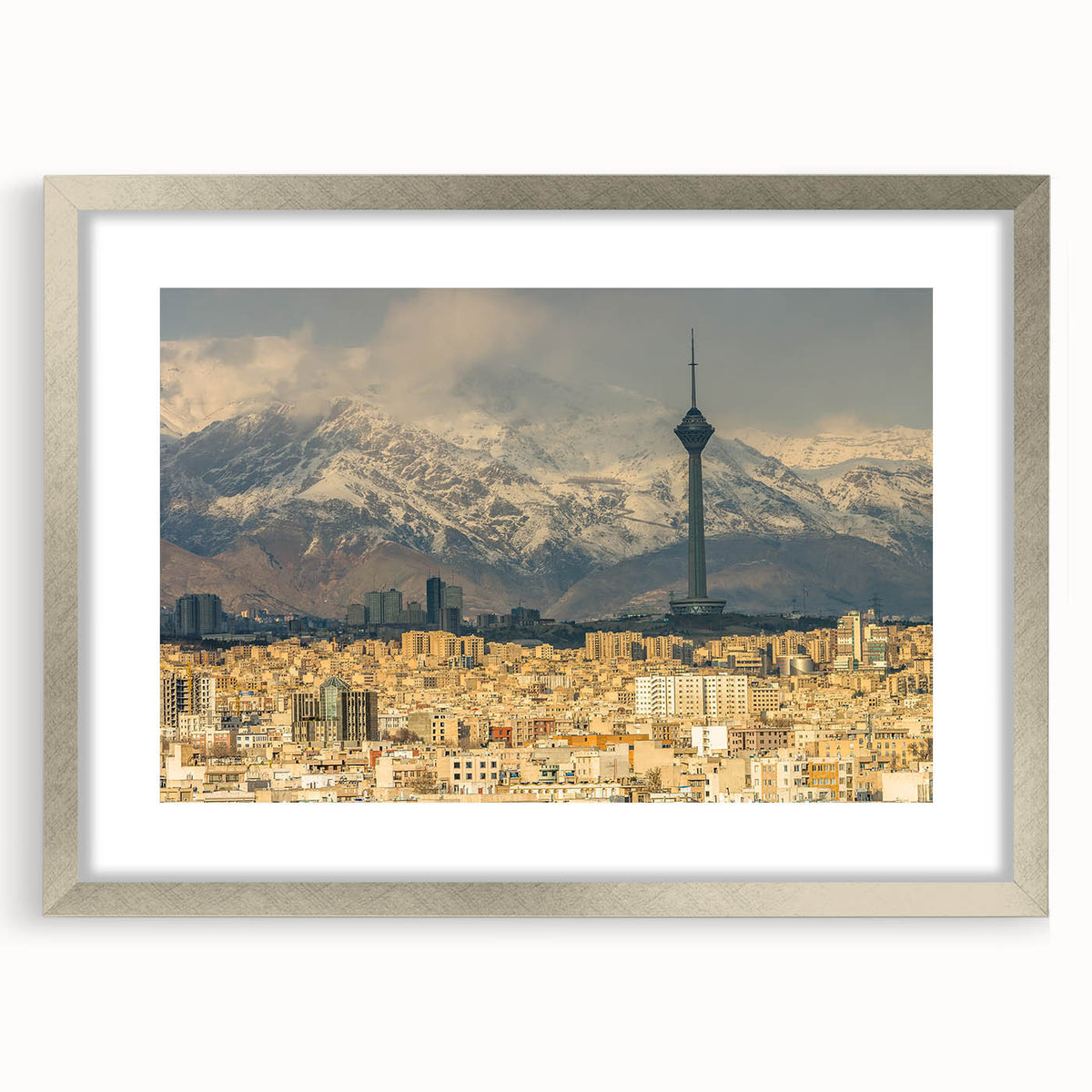Textured art print of an abstract Middle Eastern scenery in muted earth tones, framed in silver, ideal for bedroom art.