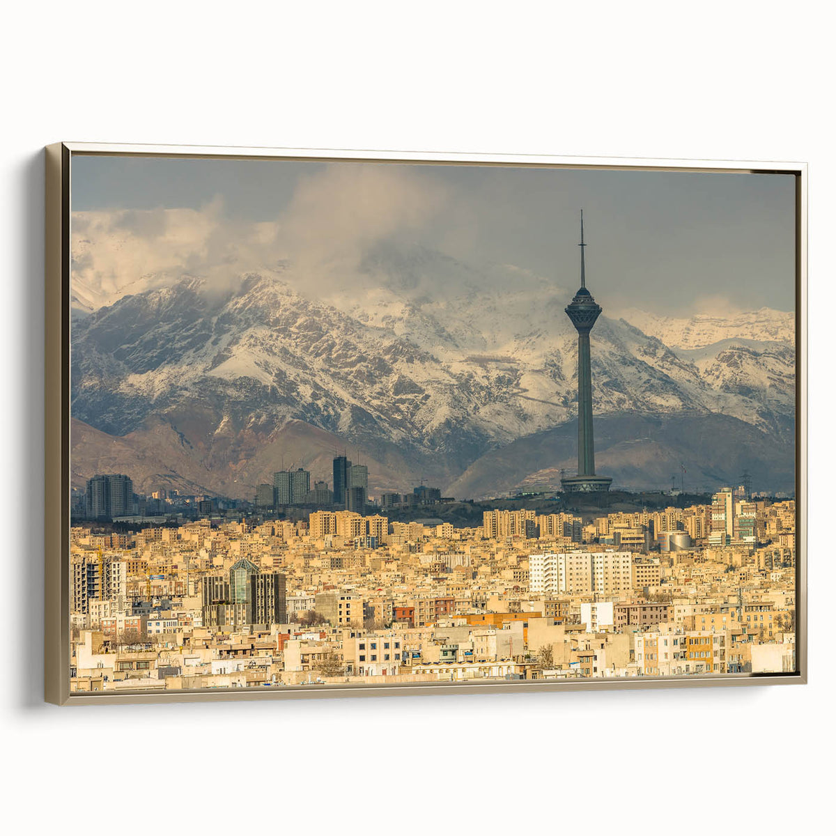 Framed canvas featuring a vintage-style landscape painting of a Middle Eastern scenery in gold and black tones.