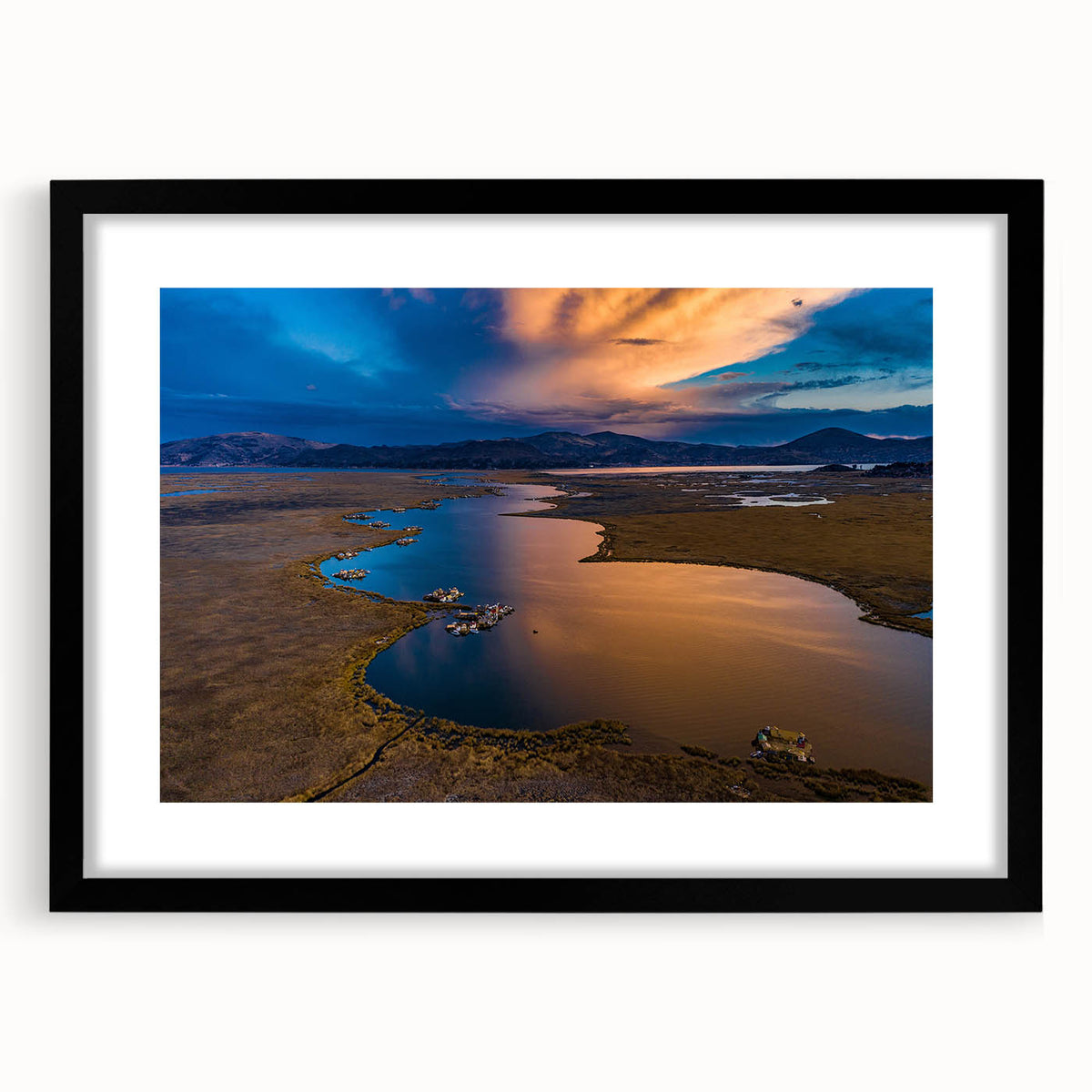 Colorful abstract art print of a stylized South American scenery in an extra large black frame, ideal for living room decor.