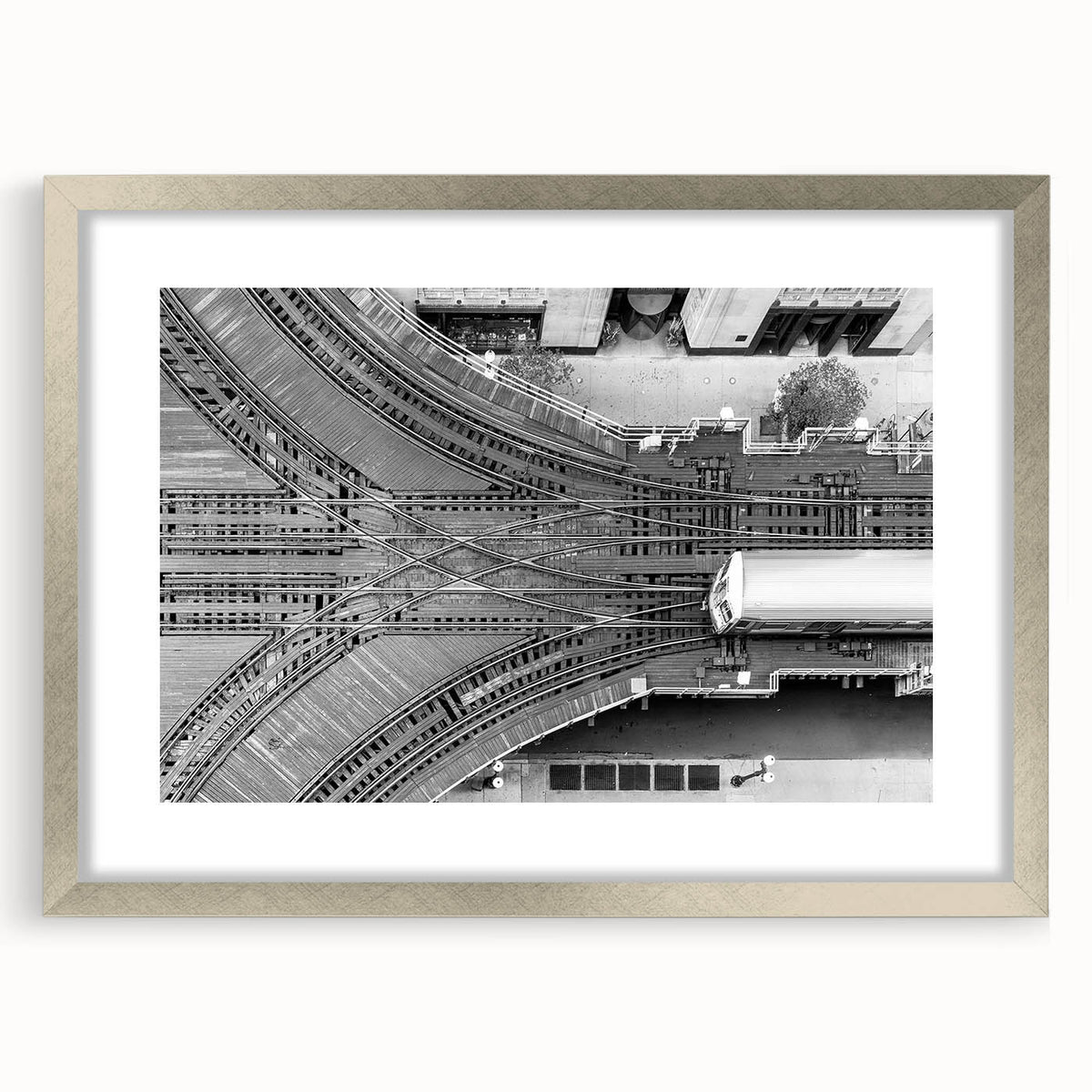 Textured abstract art print of Chicago skyline in muted gray and silver, framed with a mat, ideal for bedroom wall decor.